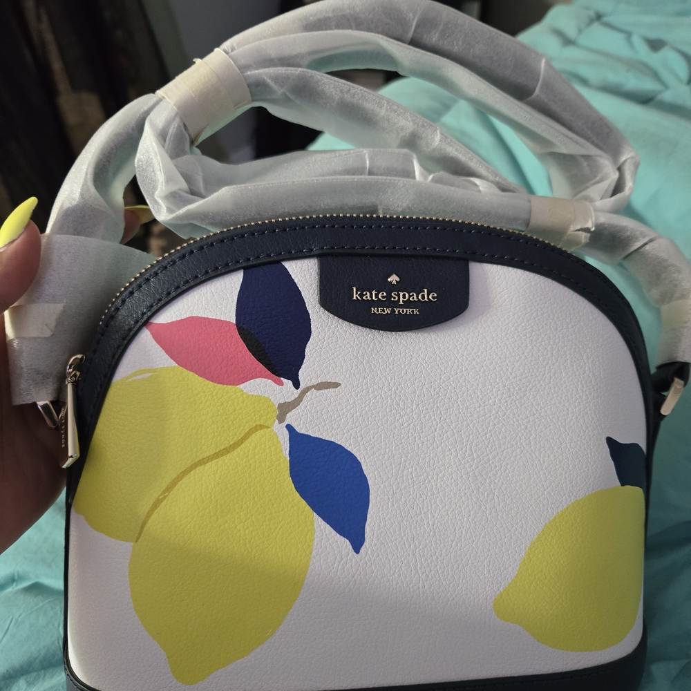 kate spade White and Yellow Crossbody Bag
